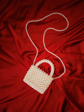 Off-White Pearl bag with intricate beaded design