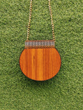 Backside of Customized Reddish Curved Wooden Crossbody Bag from Pakistan