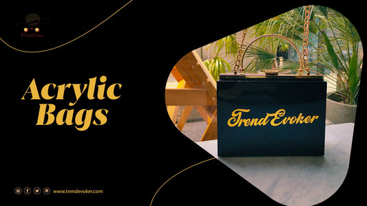 Model holding a transparent acrylic clutch bag in Pakistan at a formal event.