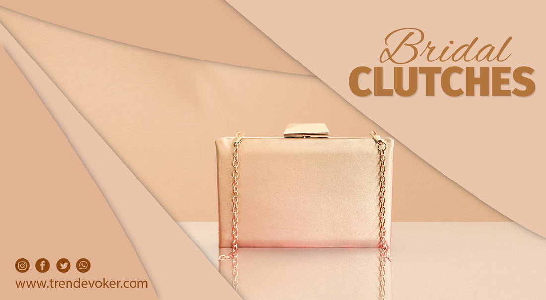 Elegant bridal clutch bag in gold with pearl embellishments – perfect for Pakistani wedding dresses.