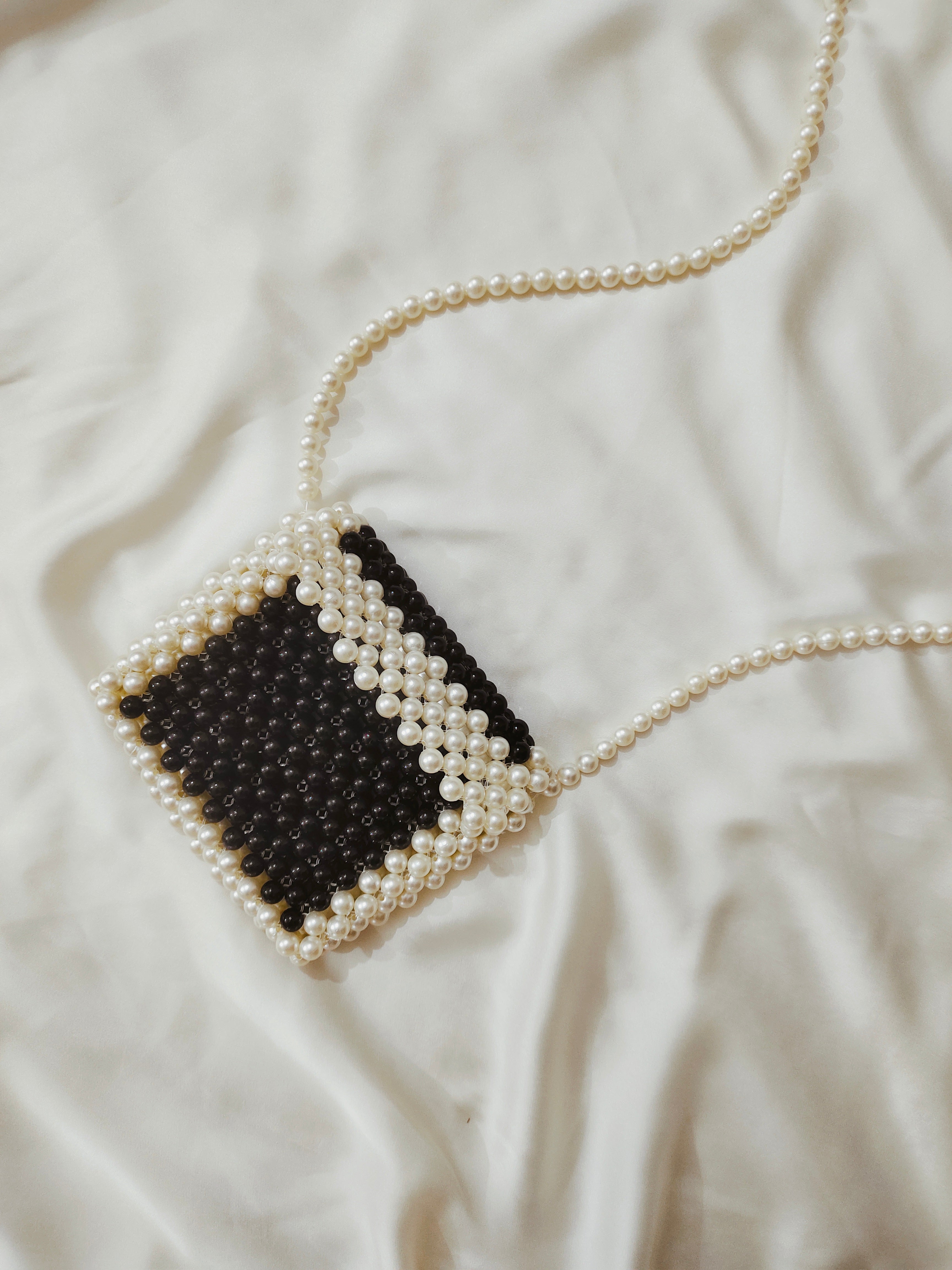 Handcrafted Elegance: White & Black Beaded Cross Body Bag with Beaded strap