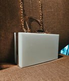 Handcrafted white acrylic tote bag providing a fashionable and practical alternative to traditional leather handbags for women
