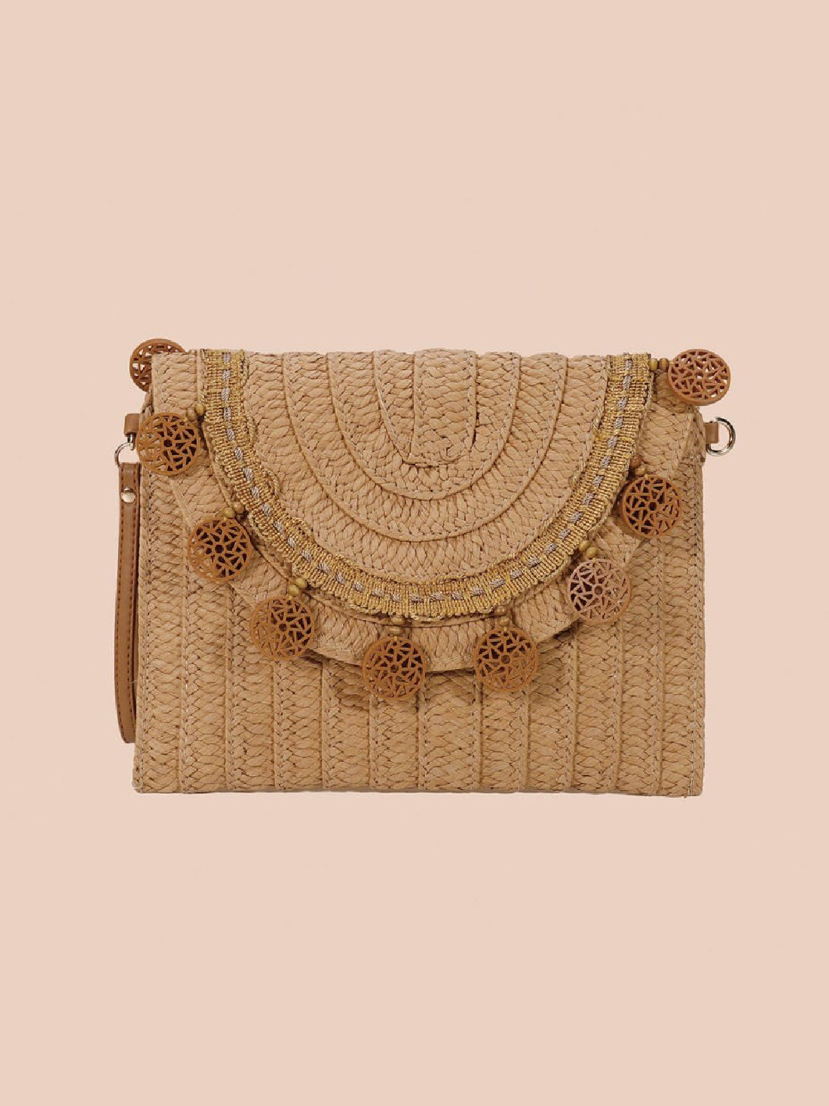 Vintage wicker fringe bag adorned with distinct brown rings, showcasing a blend of traditional craftsmanship and elegant design. Dual straps allow for versatile wear, merging the charm of bygone eras with contemporary functionality