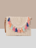 Wicker Fringe Vintage Clutch with vibrant multicolor fringes on off-white